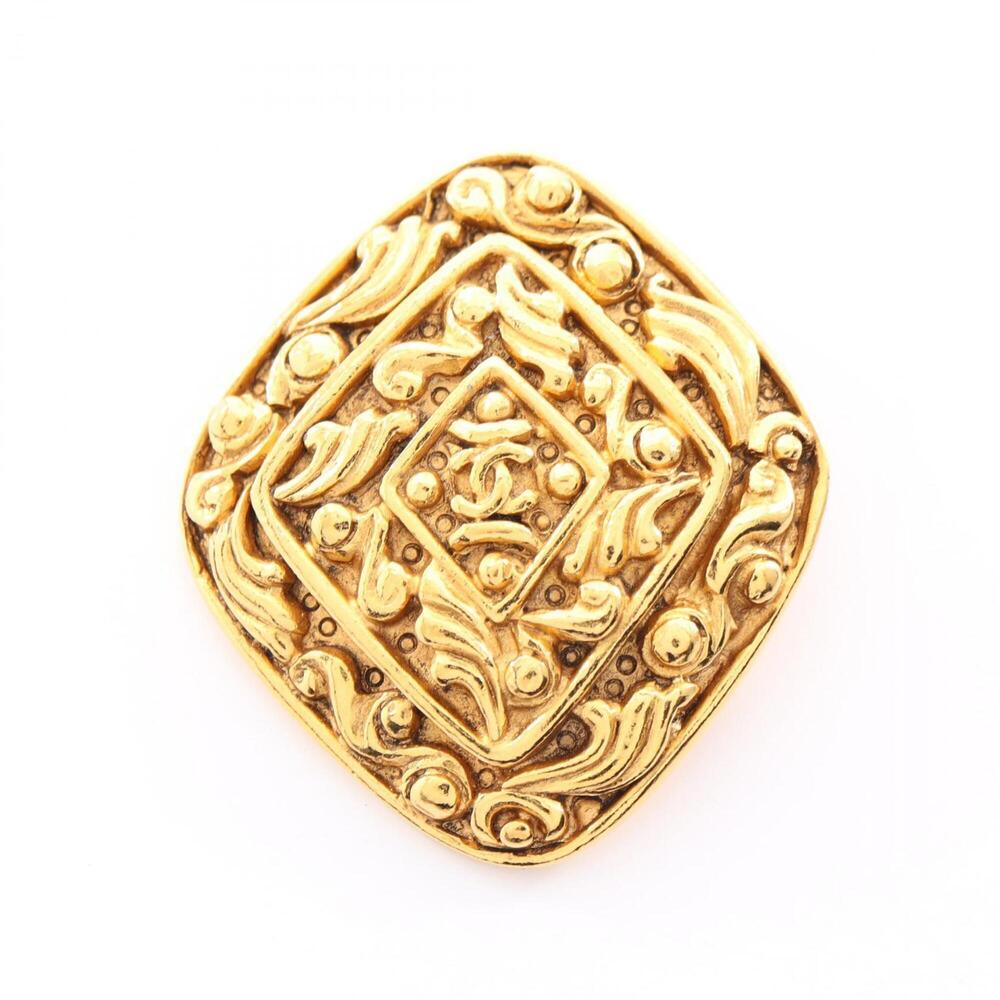 CHANEL Gold Logo Brooch